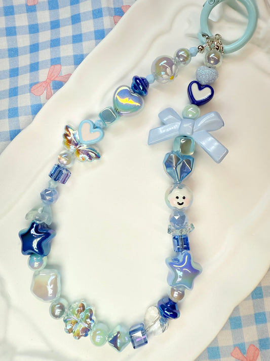 Dainty blue phone charm