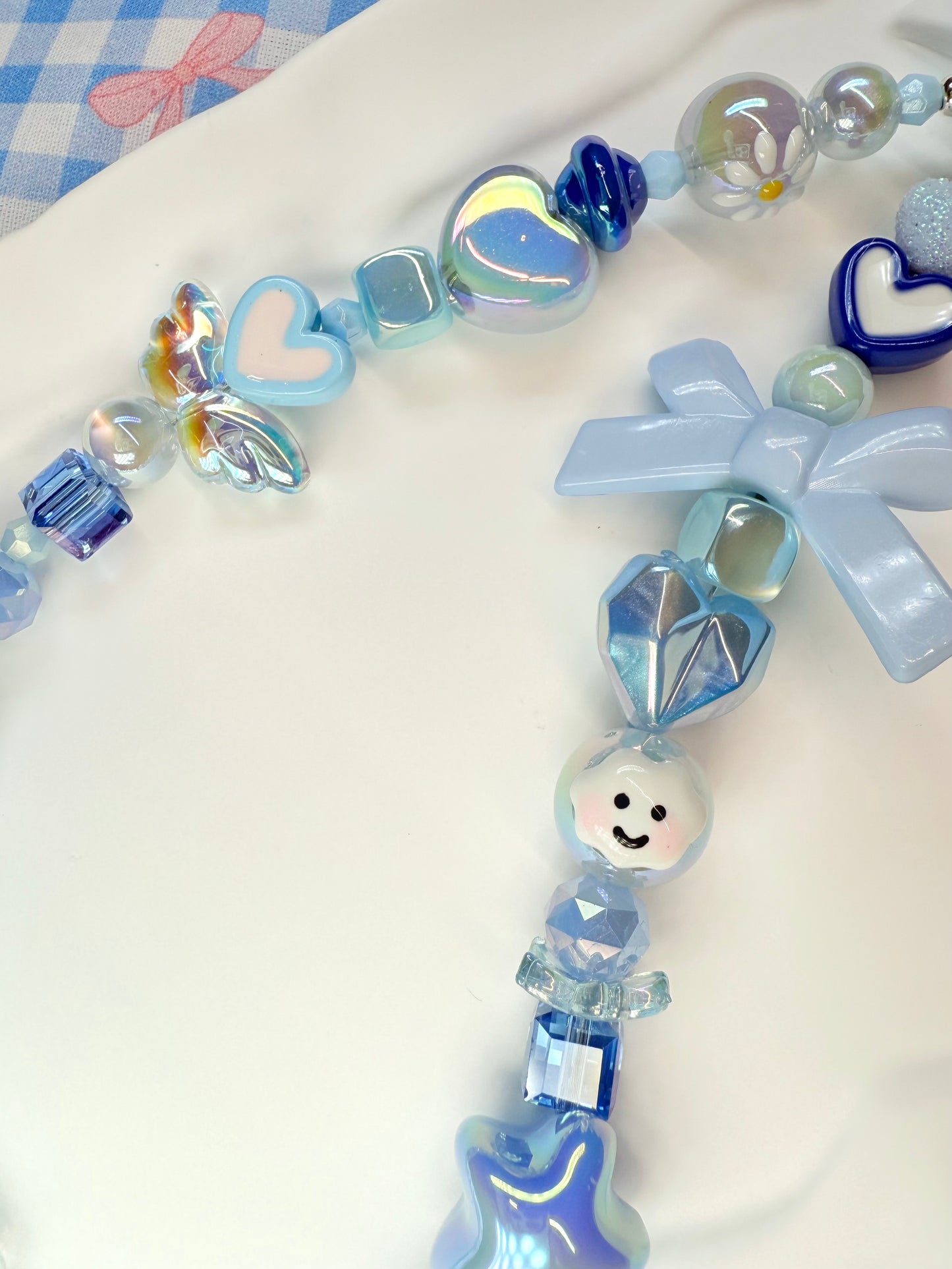 Dainty blue phone charm
