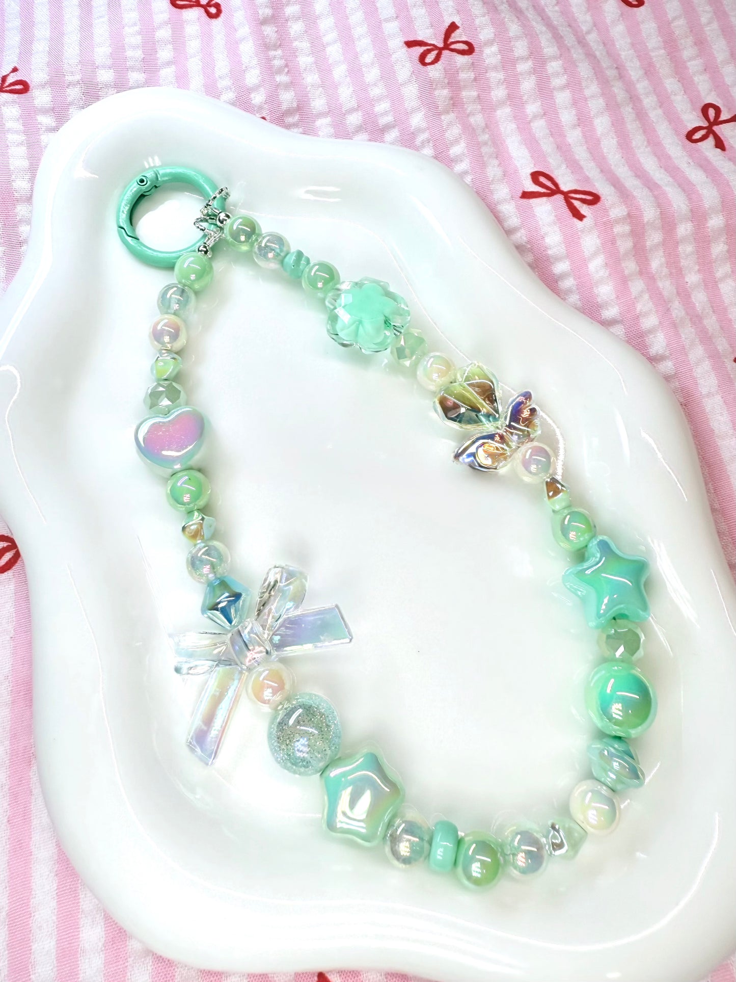 Dainty pastel green phone charm