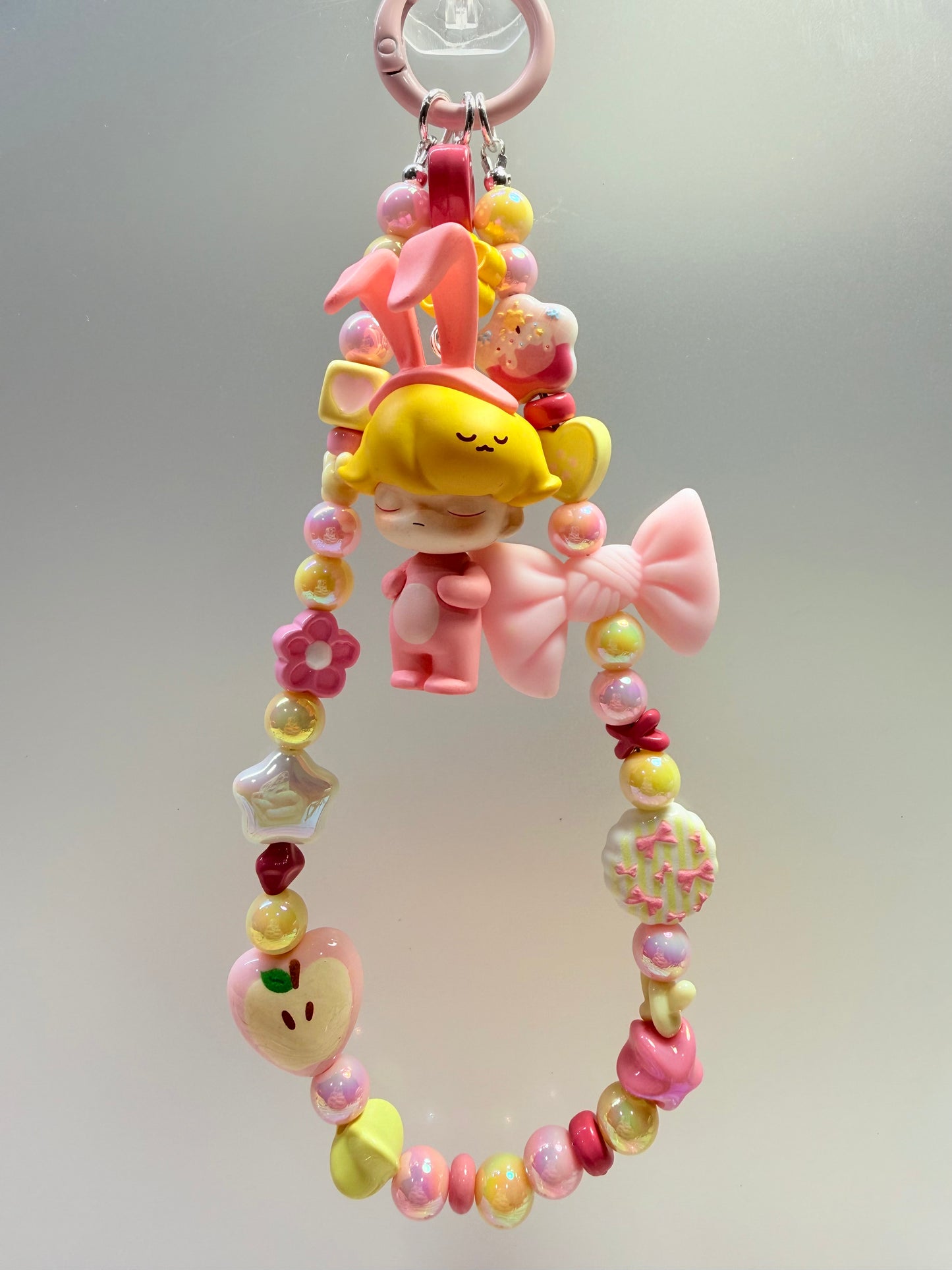 Dimoo pink & yellow phone charm strap