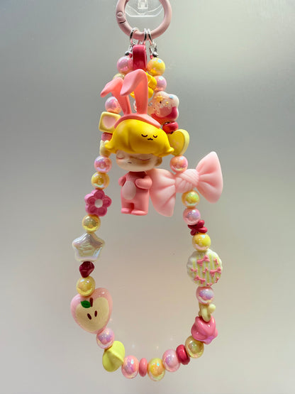 Dimoo pink & yellow phone charm strap