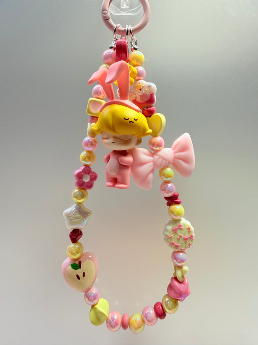 Dimoo pink & yellow phone charm strap