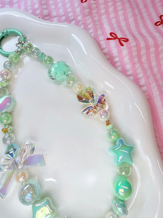 Dainty pastel green phone charm